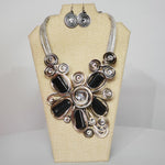 Load image into Gallery viewer, Black &amp; Gold Wire Wrap (Flower) Necklace &amp; Earrings
