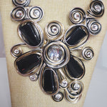 Load image into Gallery viewer, Black &amp; Gold Wire Wrap (Flower) Necklace &amp; Earrings
