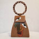 Load image into Gallery viewer, Handpainted Camel Colored Handbag Abstract Face (Clutch)

